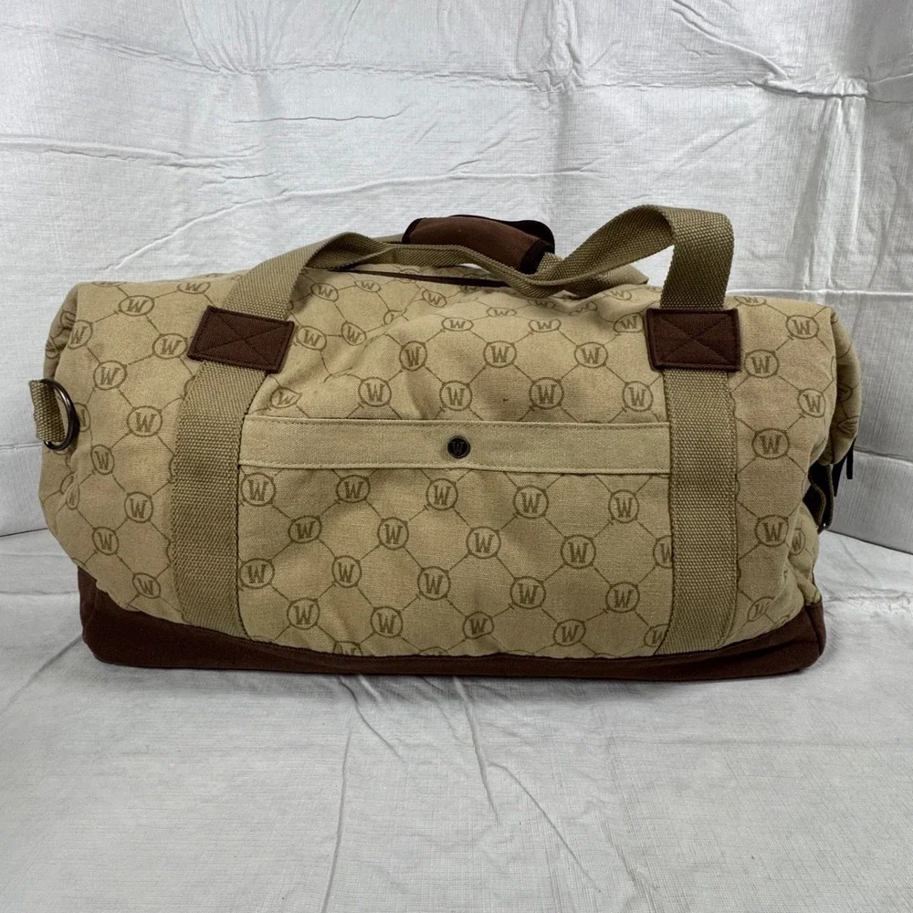 World of Warcraft Blizzard Entertainment Duffle Bag B63131 Tan Brown Logo
